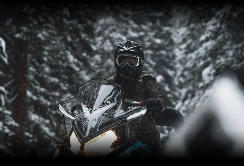 a man riding on the snow