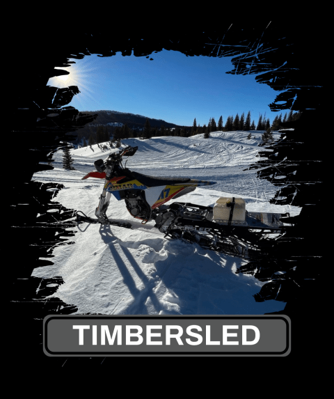 a group of people riding skis on top of a snow covered slope